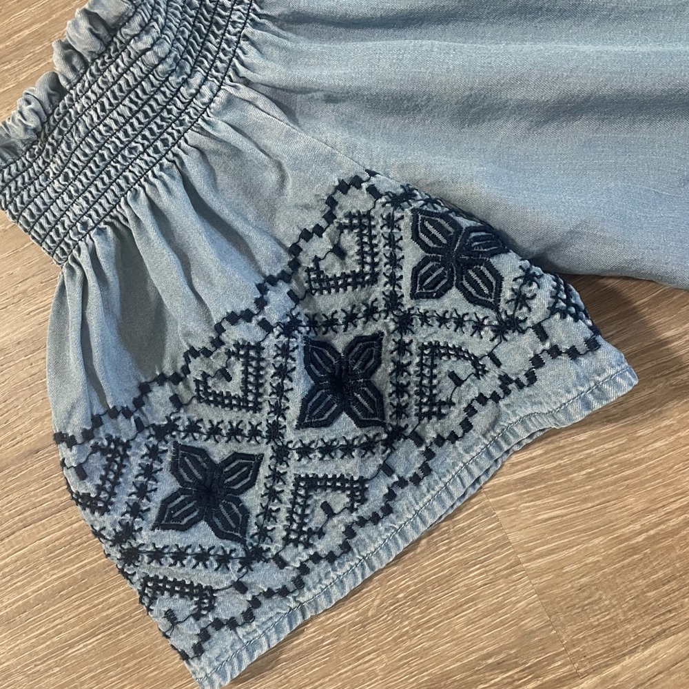 Off the shoulder light denim and embroidered top